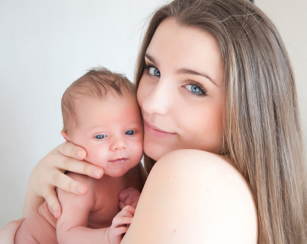 Picture of happy young mother with newborn baby - Fotografie, Obrázek