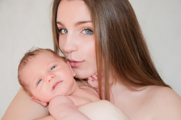 Picture of happy young mother with newborn baby - Foto, imagen