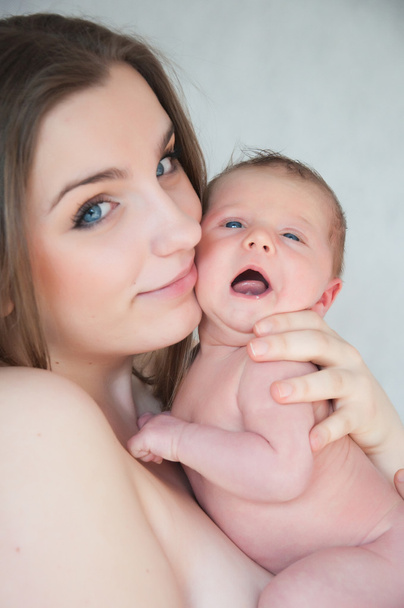 Picture of happy young mother with newborn baby - Zdjęcie, obraz