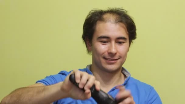 Young happy men shave his head - Footage, Video