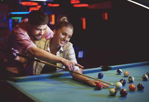 Couple playing pool game  - Photo, Image