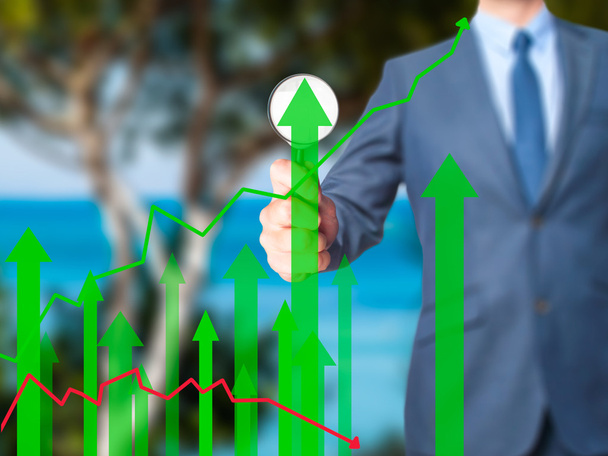 Sales Growth Graph - Бізнесмен тримає збільшувальне скло на шкурі
 - Фото, зображення