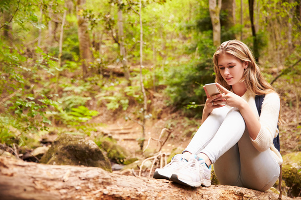 Teenage girl using smartphone  - Photo, Image