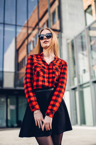 Young business woman standing near office building - Valokuva, kuva