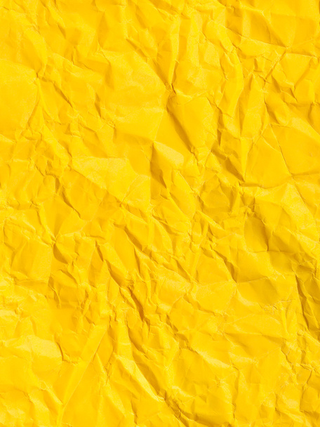 verticale achtergrond van gele verfrommeld papier - Foto, afbeelding