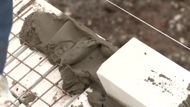Mason Lays Brick Wall of the House - Footage, Video