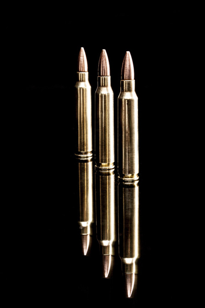 Tres balas de oro
 - Foto, imagen