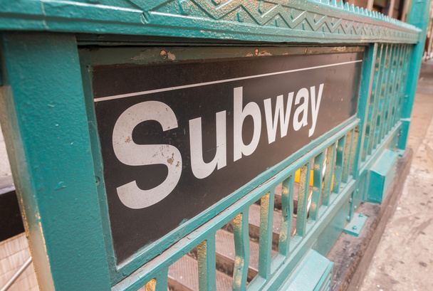 Subway entrance sign in city - Foto, imagen