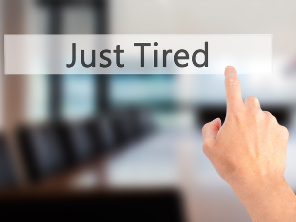 Just Tired - Hand pressing a button on blurred background concep - Photo, Image