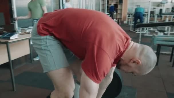 Atleta olímpico levantar barra de peso pesado
 - Imágenes, Vídeo