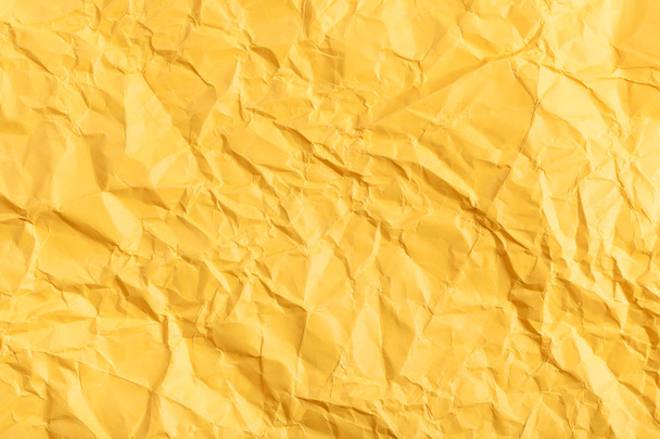 background from yellow crumpled paper - Fotografie, Obrázek