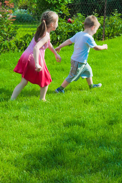 Kids playing with the ball - Фото, зображення