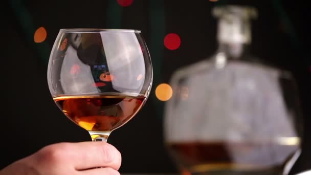 man tasting a glass of cognac - Footage, Video