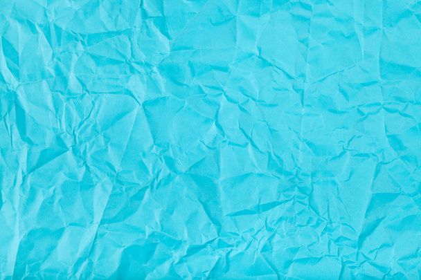 achtergrond van blauwe verfrommeld papier - Foto, afbeelding
