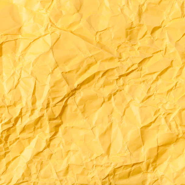 vierkante achtergrond van gele verfrommeld papier - Foto, afbeelding