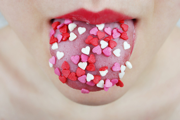 Women's tongue with hearts - Fotografie, Obrázek