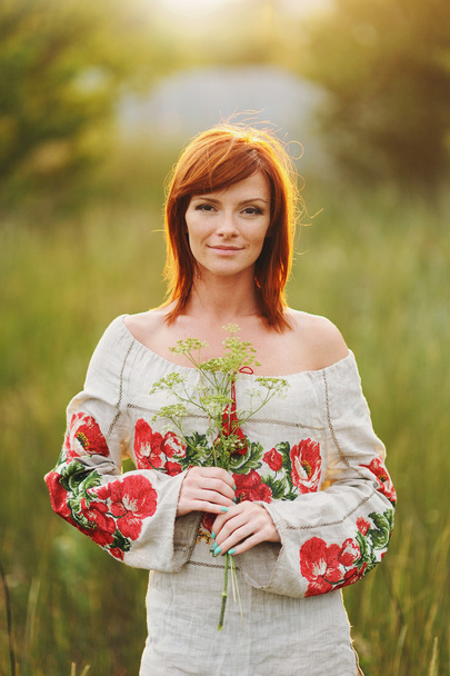 portrait of the bright young Ukrainian girl with red hair - Фото, изображение