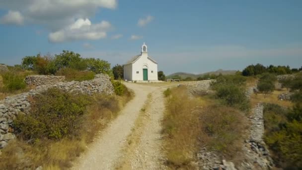Passing church on island hill - Footage, Video