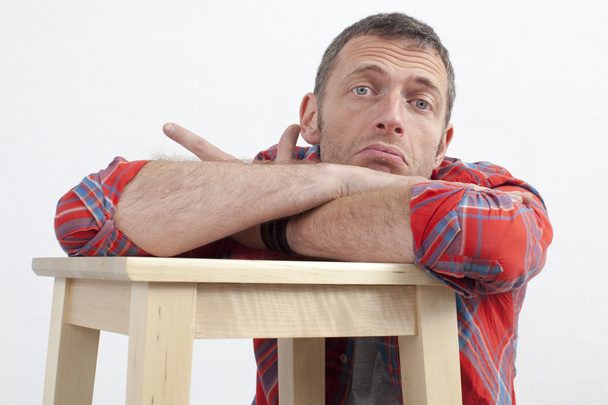 lazy 40s man with casual body language expressing frustration - Foto, Imagen