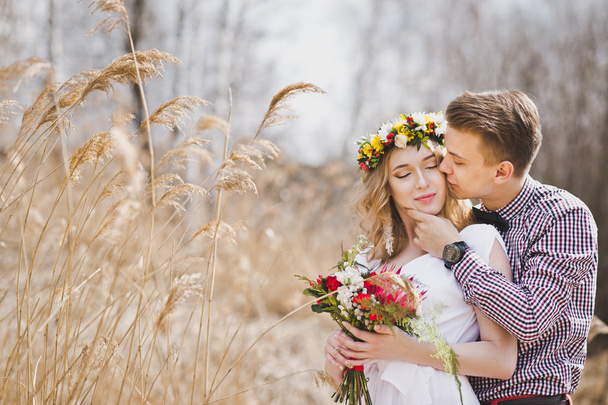 Portrait of a young couple on a background of reeds 5835. - Photo, image