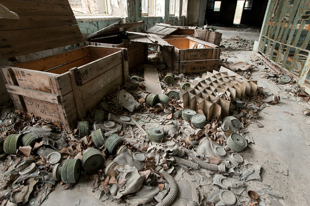 abandoned gas masks on the floor of the school in the town of Pr - Photo, Image