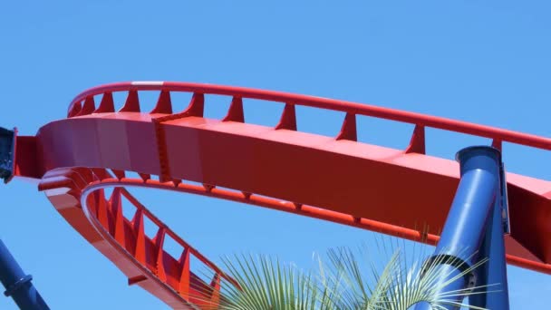 Roller Coaster Speeds Through Frame on Sharp Turn, 4K - Footage, Video