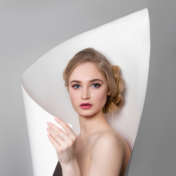 blonde girl in paper - Photo, Image