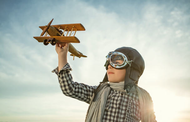 Little boy with airplane - Photo, Image