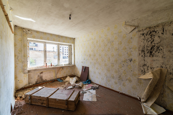 Abandoned interior in ruins of military settlement - Foto, afbeelding