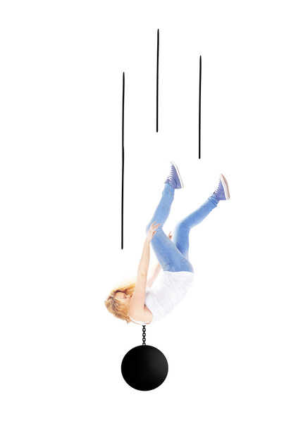 Woman falling with metal ball around her neck - Fotó, kép
