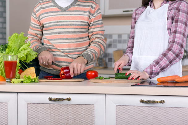 Family cooking Salad together - 写真・画像
