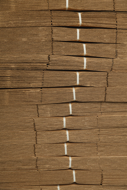 Cardboard pile on corrugated cardboard texture - Foto, Bild