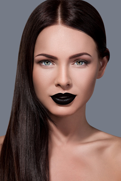 brunette woman with black lips - Photo, Image