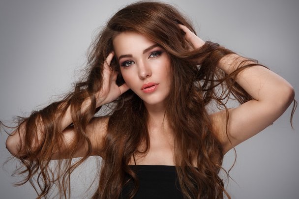 woman with long curly hair - Foto, imagen
