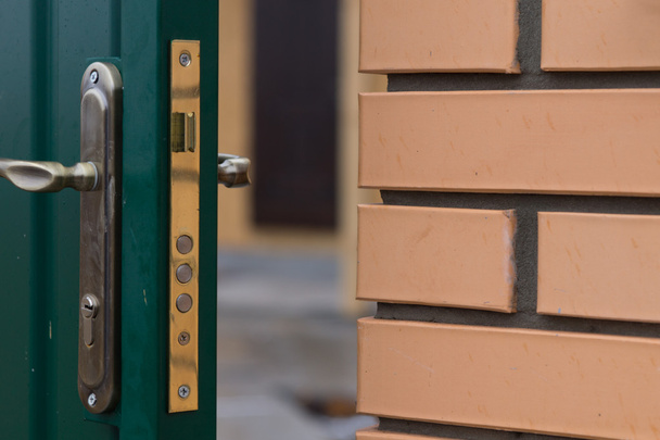 Triple security lock on a new door - Φωτογραφία, εικόνα