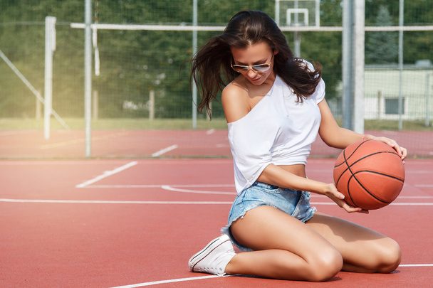 Sexy girl with basketball ball - Photo, Image