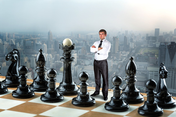 Businessman on the chess board - Photo, Image