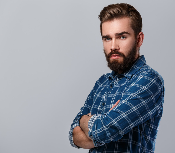 bearded man in checkered shirt - Foto, afbeelding