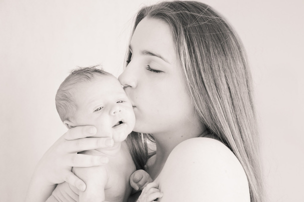 Picture of happy young mother with newborn baby - Foto, immagini