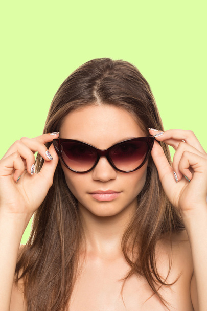 fashion beautiful woman portrait with long hair wearing sunglasses - Photo, image