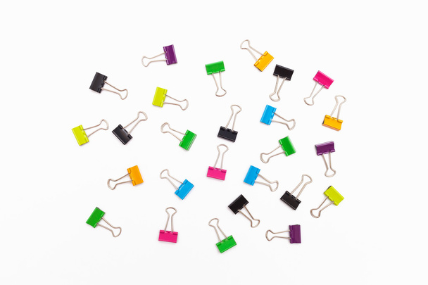 Colorful binder clips on a white background - Photo, Image