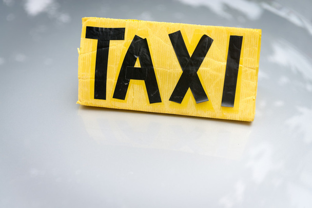 Cartello taxi giallo e nero fatto a mano
 - Foto, immagini