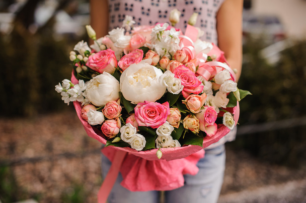 Rich bunch of white and pink flowers in hands  - Fotoğraf, Görsel