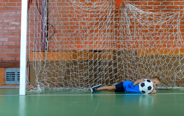 Young goalie saving a goal - Photo, Image