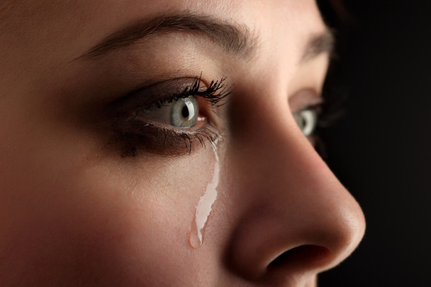 Beauty girl cry on black background - Фото, изображение