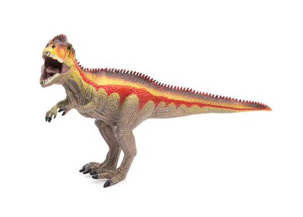 вид сбоку гигантозавровая игрушка на белом фоне
 - Фото, изображение