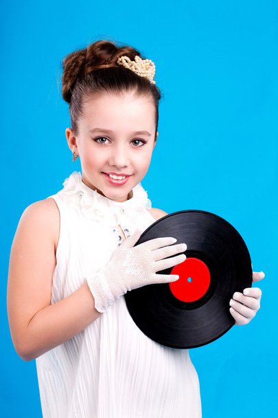 A girl with vinil record - Foto, Bild