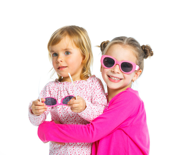 Two young beautiful girls in glasses - Photo, image