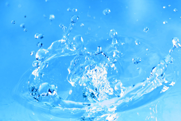 Blue water splash - Foto, afbeelding