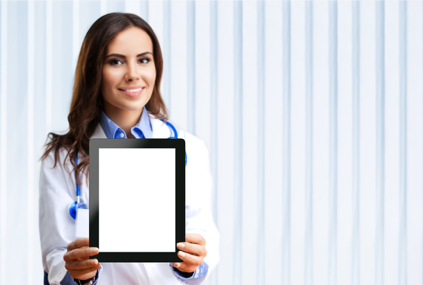 Doctor showing blank tablet pc for copyspace - Photo, image